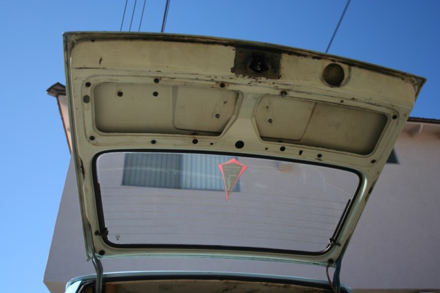 Square Drop Rear Hatch Rear hatch was replaced at one point and is beige on the backside.